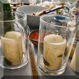 D24. Glass candle holders and birch candles 